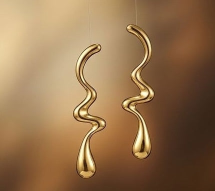Abstract gold drop earrings styled for women JeevaFashions