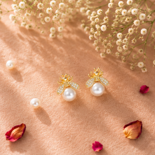 Gold tone bee earrings with CZ wings closeup for women JeevaFashions