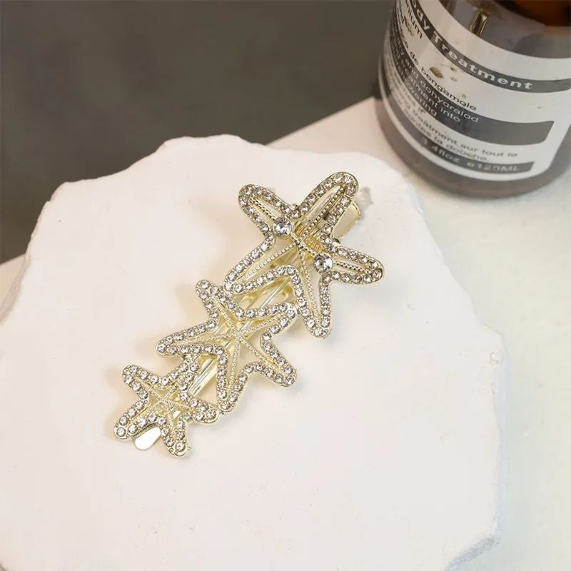Golden crystal starfish hairclip for women JeevaFashions