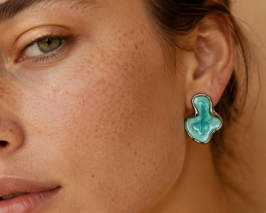 Gold tone teal abstract earrings closeup for women JeevaFashions