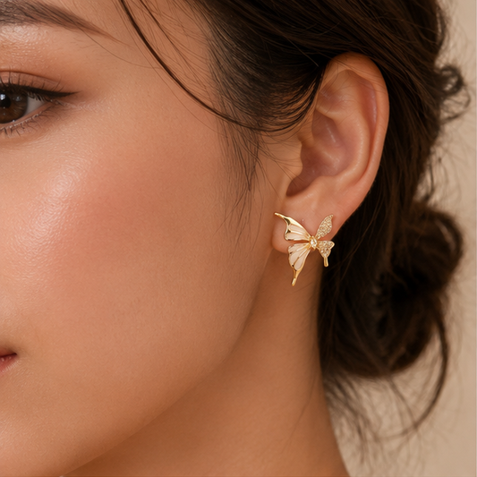 Gold tone two-tone butterfly earrings closeup for women JeevaFashions