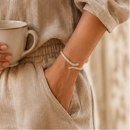 Close-up of rectangular baguette-cut AD stones on gold plated snake tennis bracelet – JeevaFashions