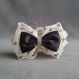 Dual-layer bow hair claw in beige organza and black satin with crystal centre for women – daily and festive wear