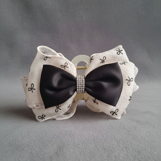 Dual-layer bow hair claw in beige organza and black satin with crystal centre for women – daily and festive wear