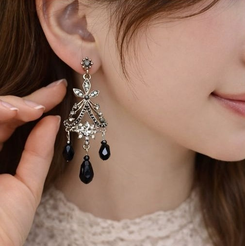 Black crystal chandelier earrings close up detail JeevaFashions