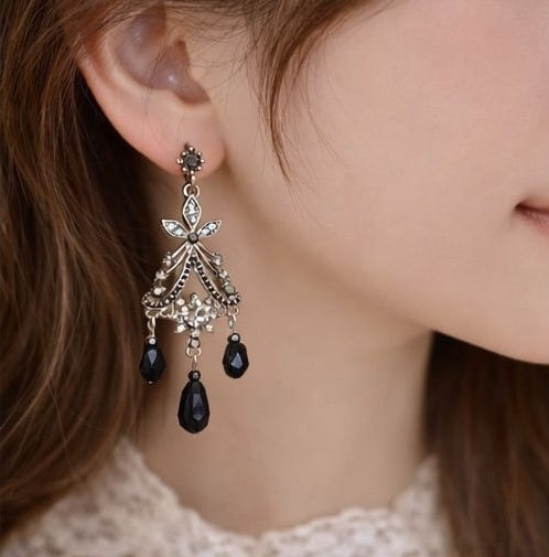 Black crystal chandelier earrings styled for weddings JeevaFashions