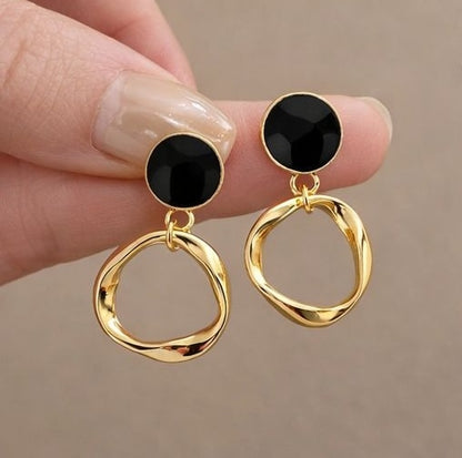 Black and gold geometric drop earrings styled for women JeevaFashions