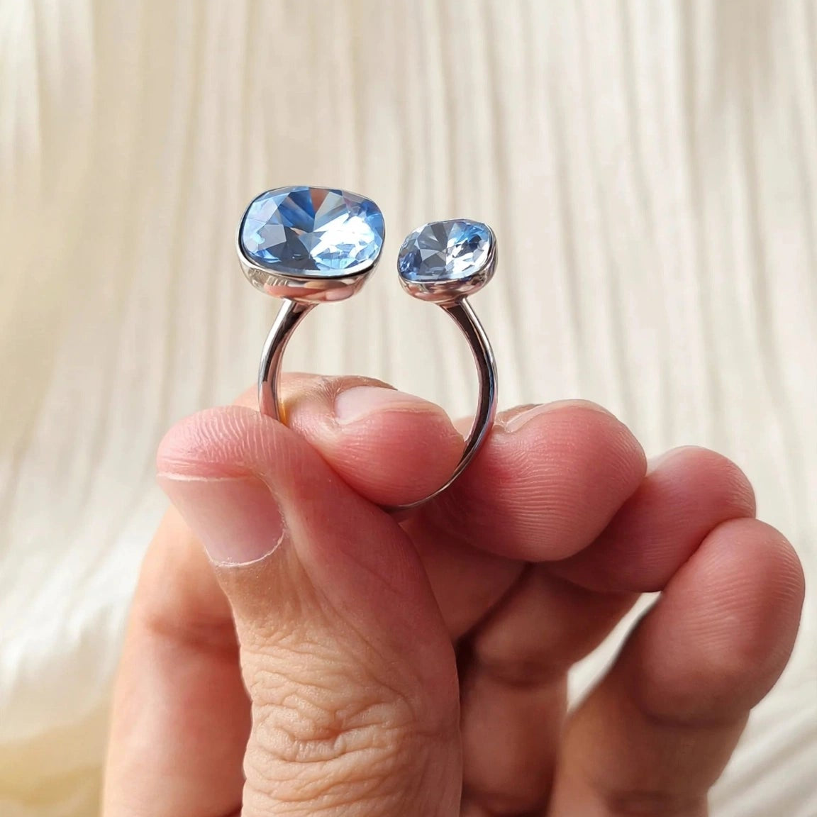 Blue crystal open ring detail shot square cushion cut for women at JeevaFashions