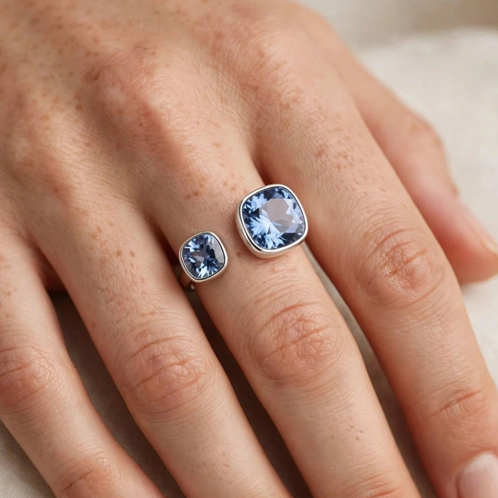 Blue crystal open ring styled on hand for women at JeevaFashions