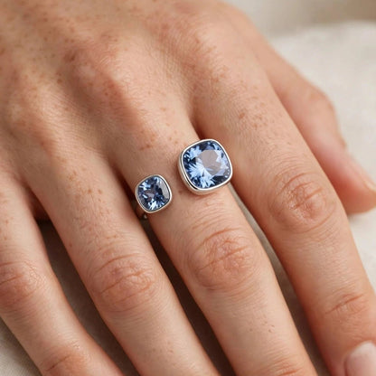 Blue crystal open ring styled on hand for women at JeevaFashions