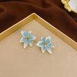 Blue and white lily stud earrings gold tone for women JeevaFashions