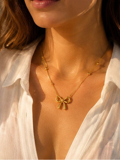 Gold plated bow pendant necklace styled for daily wear – lightweight and comfortable for all-day use