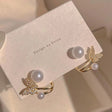 Butterfly pearl stud earrings crystal gold tone for women JeevaFashions