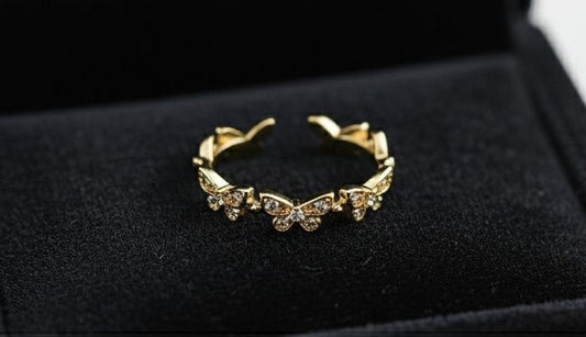 Gold butterfly ring for women with CZ crystal accents
