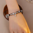 Hand-crafted celestial bead bracelet with silver charms JeevaFashions