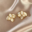Cream petal cluster stud earrings gold tone for women JeevaFashions