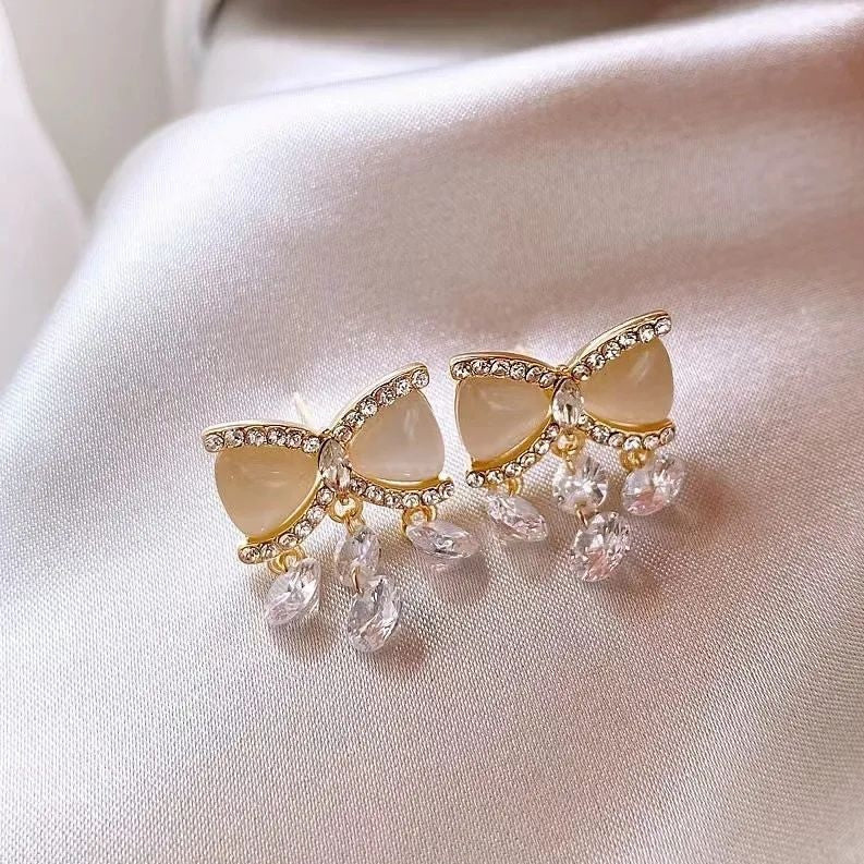 Crystal bow stud earrings with dangle drops – enamel rhinestone party wear earrings for Indian women – festive and wedding occasions