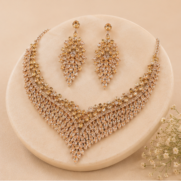 Crystal fringe necklace earring set close-up – champagne CZ stones gold tone for festive occasions