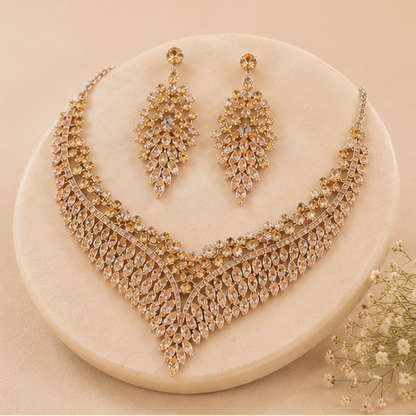 Crystal fringe necklace earring set close-up – champagne CZ stones gold tone for festive occasions