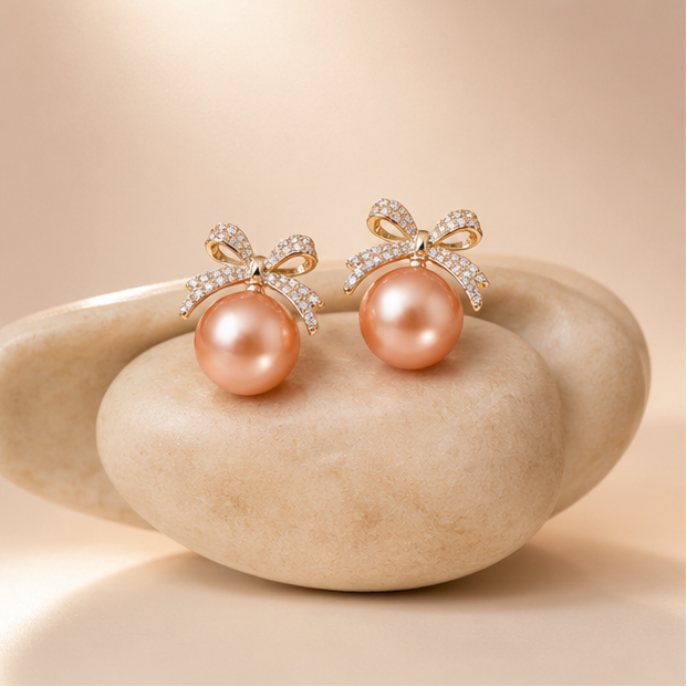 CZ bow peach pearl earrings for weddings and sangeet JeevaFashions