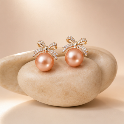 CZ bow peach pearl earrings for weddings and sangeet JeevaFashions