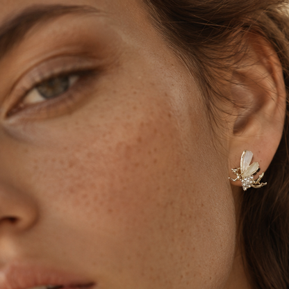 Gold tone fairy CZ earrings closeup for women JeevaFashions