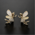 Fairy CZ stud earrings gold tone wings for women JeevaFashions