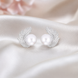 Feather stud earrings with rhinestone inlay and pearl-tone finish – 925 sterling silver hypoallergenic earrings for women