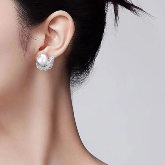 Feather pearl stud earrings styled on model – 925 silver rhinestone earrings for Indian women – daily wear and festive occasions