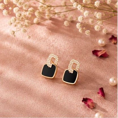 Pair of geometric black enamel gold stud earrings – lightweight push-back studs for office and casual wear