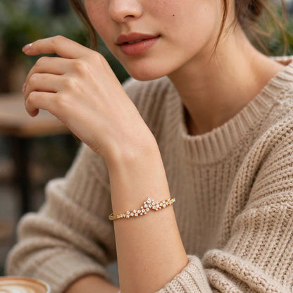 Gold openable kada bangle with centre CZ crystal for festive wear at JeevaFashions