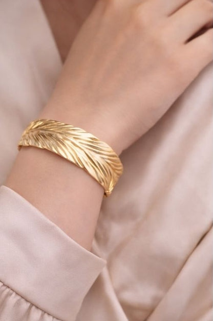 Adjustable gold feather cuff bracelet for Indian festive wear