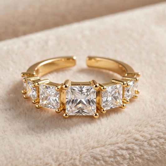 Graduated crystal open ring in gold stainless steel for women at JeevaFashions