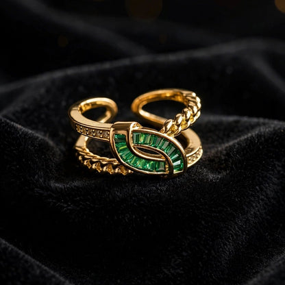 Close-up of green baguette crystal swirl on gold knot ring for women at JeevaFashions