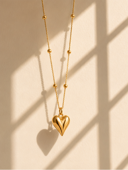 Gold heart pendant necklace styled for daily wear and travel – waterproof jewellery for women