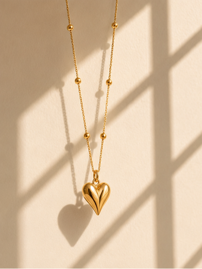 Gold heart pendant necklace styled for daily wear and travel – waterproof jewellery for women
