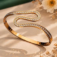 Gold kada bracelet with clear CZ crystal S-shape design JeevaFashions