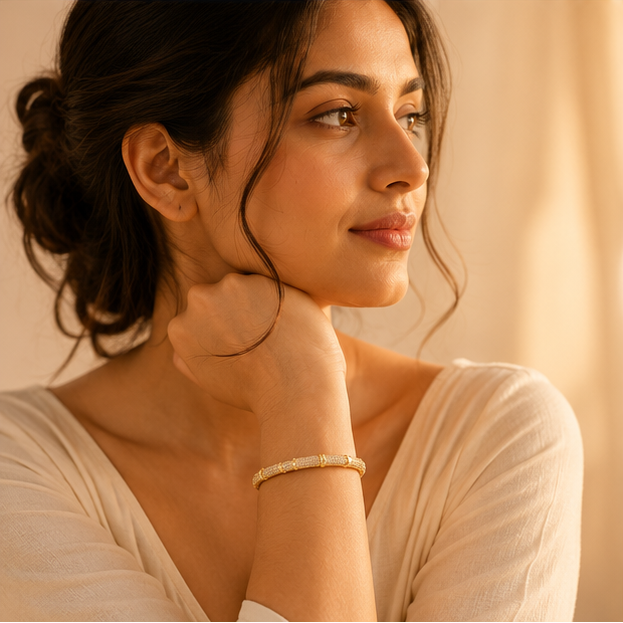 Flat lay of geometric gold kada bracelet – statement cuff bangle for women India