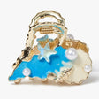 Ocean starfish pearl claw clip in gold-plated zinc alloy for women at JeevaFashions