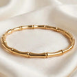 Open cuff bamboo bangle bracelet in gold stainless steel for women at JeevaFashions