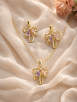 Gold plated abstract flower pendant necklace and earrings set for women at JeevaFashions