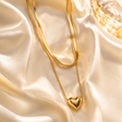 Gold plated double layer heart pendant necklace with snake chain for women – party wear and festive occasions