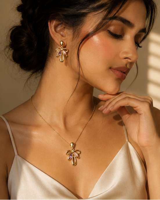 Gold plated flower pendant necklace and earring set styled for festive wear at JeevaFashions