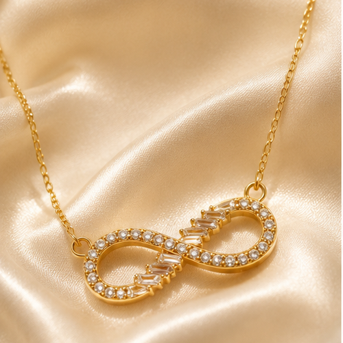 Gold plated infinity pendant necklace with round brilliant and baguette CZ stones for women – party and daily wear