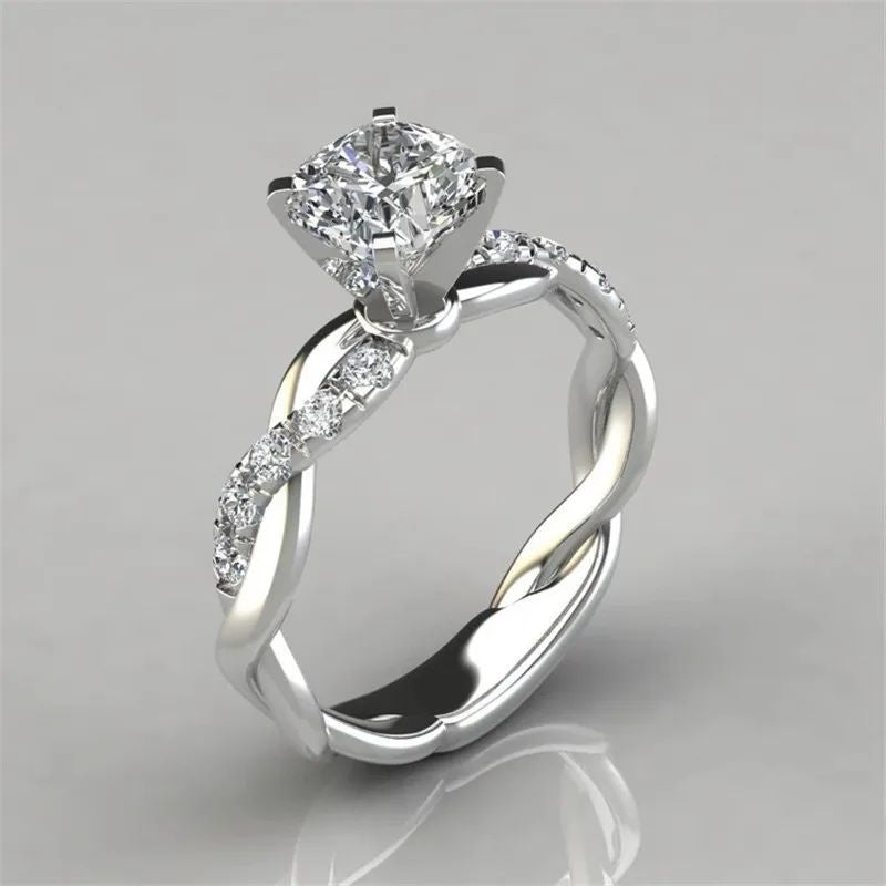 gold and silver tone crystal twisted band statement ring for women JeevaFashions