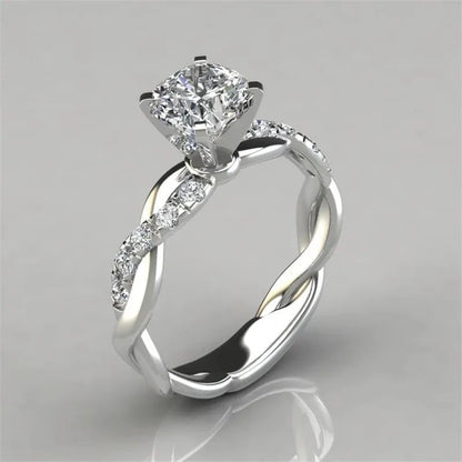 gold and silver tone crystal twisted band statement ring for women JeevaFashions