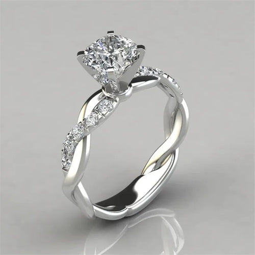 gold and silver tone crystal twisted band statement ring for women JeevaFashions