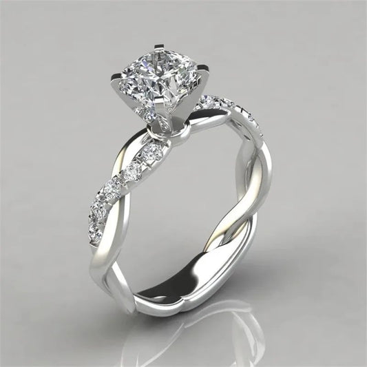 gold and silver tone crystal twisted band statement ring for women JeevaFashions