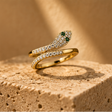 Gold snake ring adjustable serpent wrap with emerald CZ eyes JeevaFashions