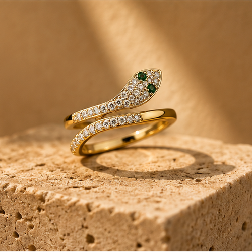 Gold snake ring adjustable serpent wrap with emerald CZ eyes JeevaFashions